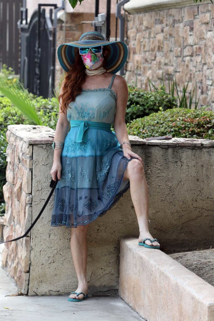Phoebe Price in a Blue Dress