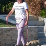 Teddi Mellencamp in a White Tee Walks Her French Bulldog in Beverly Hills