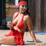 Yazmin Oukhellou in a Red Bikini by the Pool in Essex