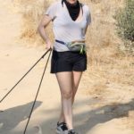 Alicia Silverstone in a Black Shorts Walks Her Dogs in Los Angeles