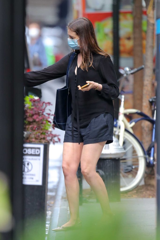 Anne Hathaway in a Black Shorts