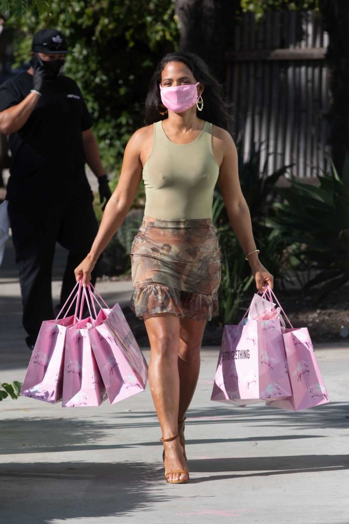 Christina Milian in an Olive Tank Top