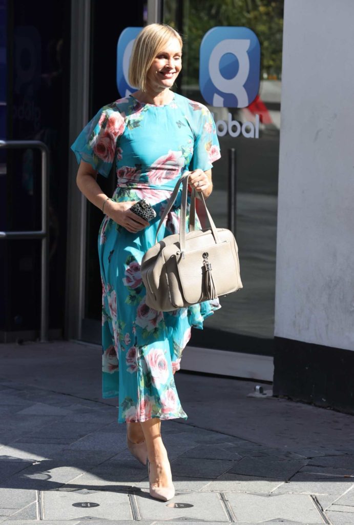 Jenni Falconer in a Turquoise Floral Print Dress