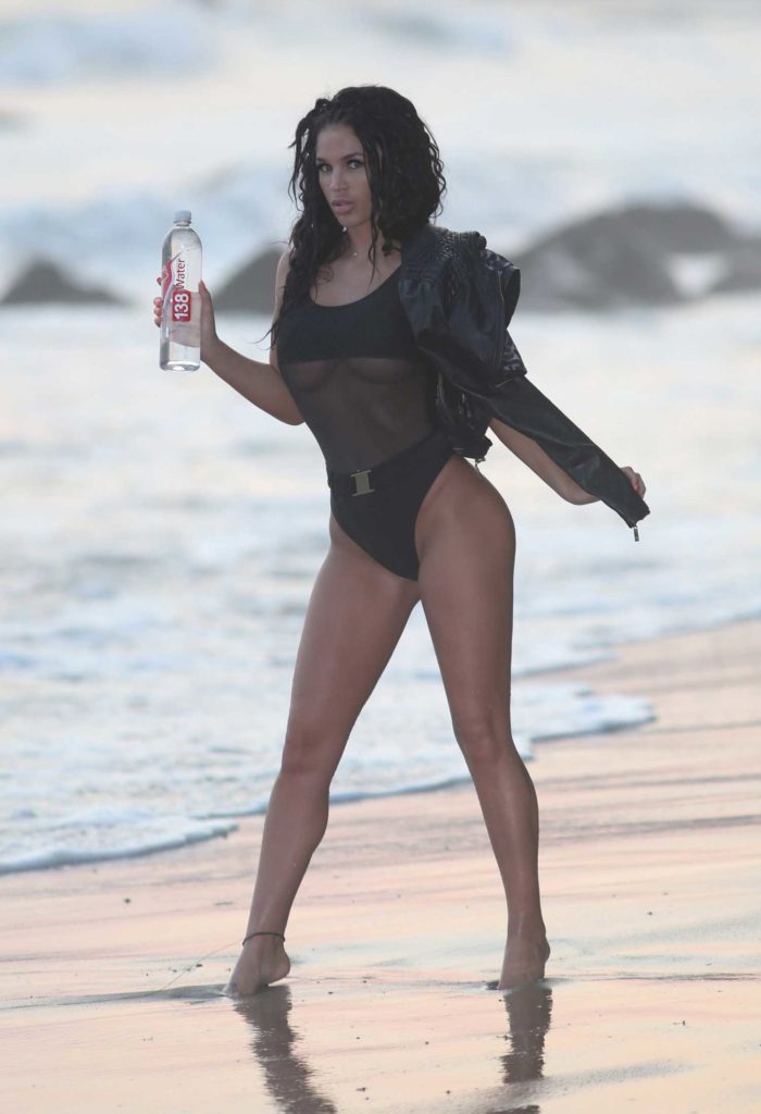 Kaymora Ferrare in a Black Swimsuit