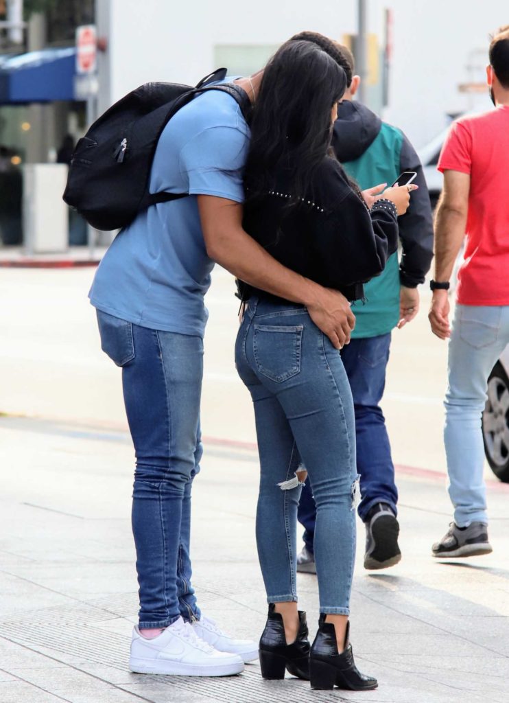 Cely Vazquez in a Blue Ripped Jeans
