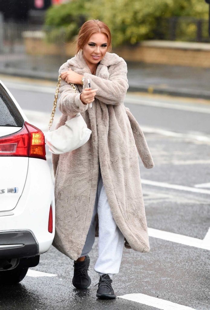 Demi Jones in a Beige Fur Coat