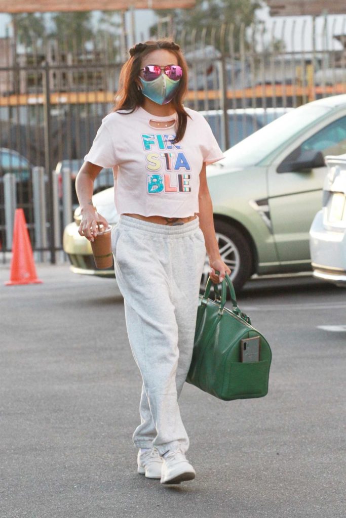 Jeannie Mai in a White Sneakers