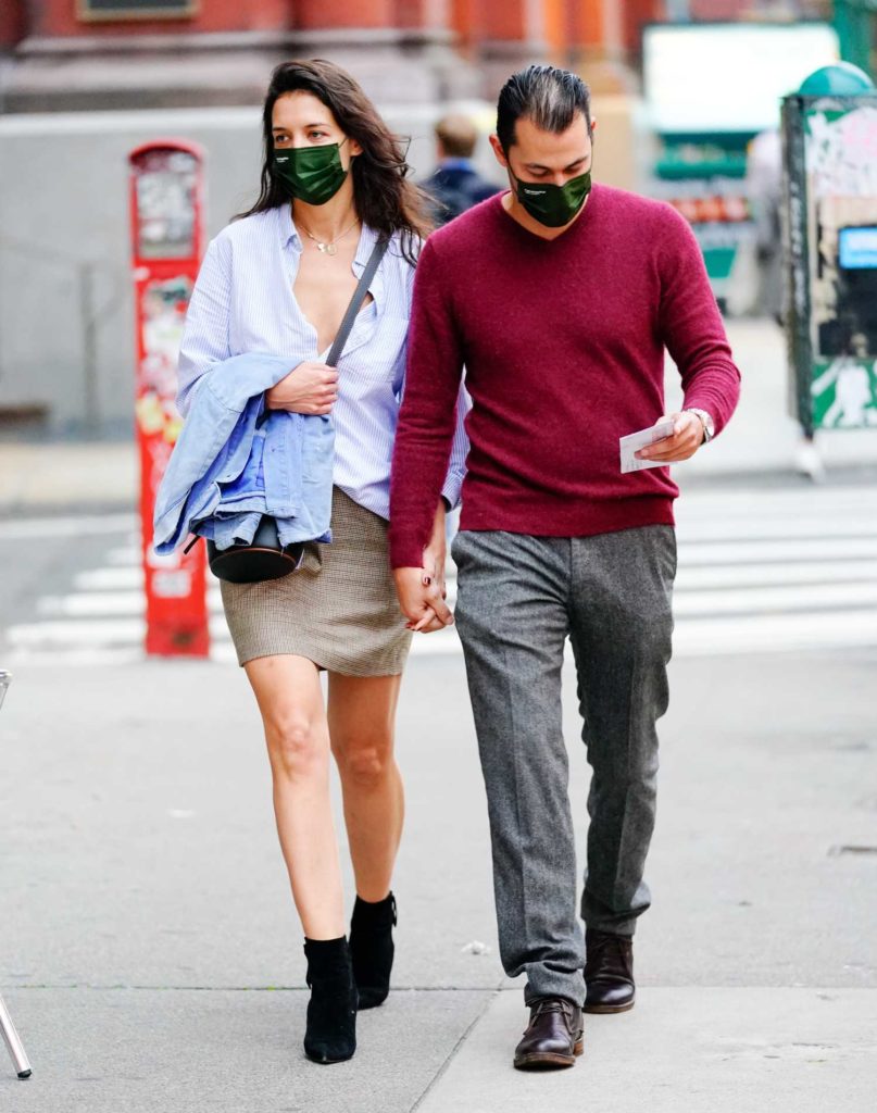 Katie Holmes in a Green Protective Mask