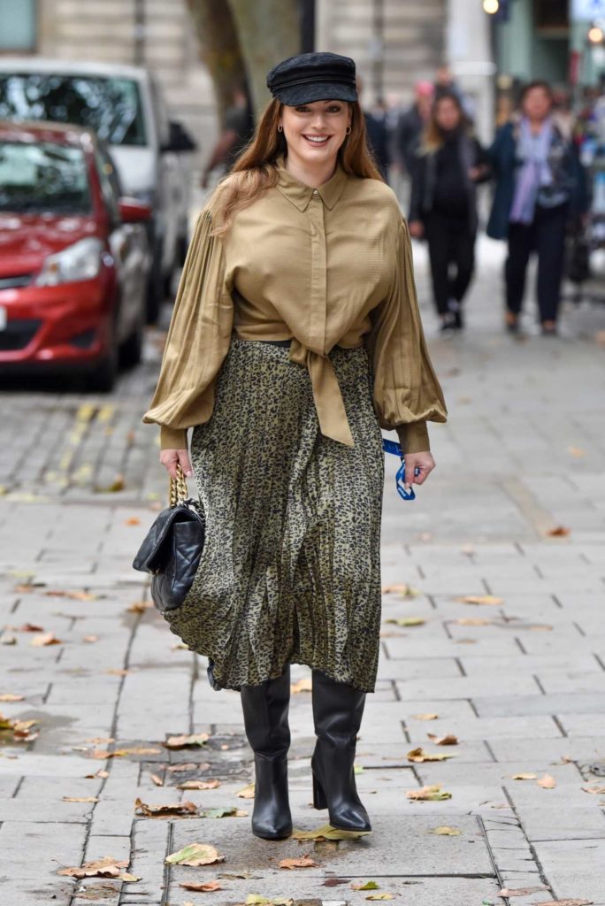 Kelly Brook in a Beige Satin Blouse