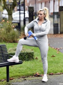 Kimberly Hart-Simpson in a Gray Workout Clothes Does a Morning Gym