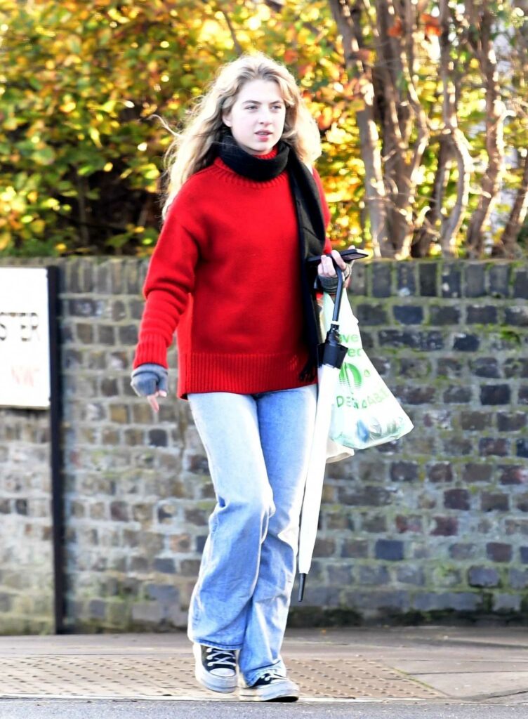 Anais Gallagher in a Red Sweater