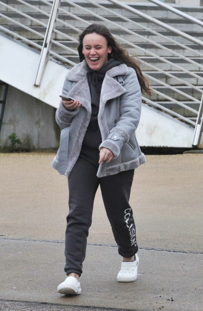 Ellie Leach in a Grey Jacket