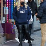 Gemma Collins in a Blue Hoodie Leaves the Kingdom of Sweets on Oxford Street in London