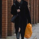 Louise Thompson in a Black Fur Coat Goes Shopping in London
