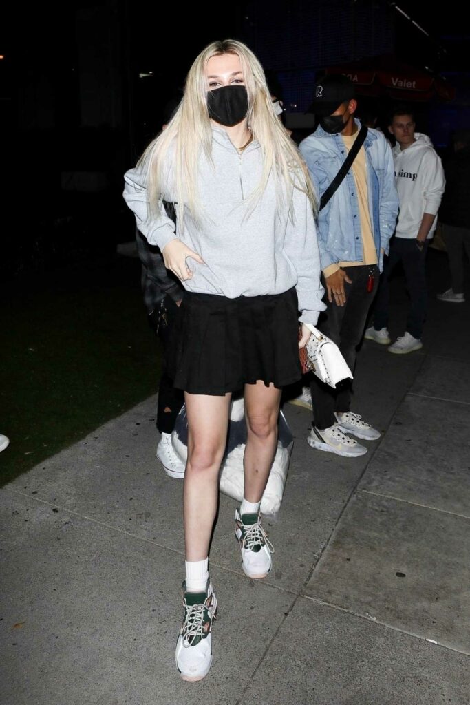 Madi Monroe in a Black Mini Skirt