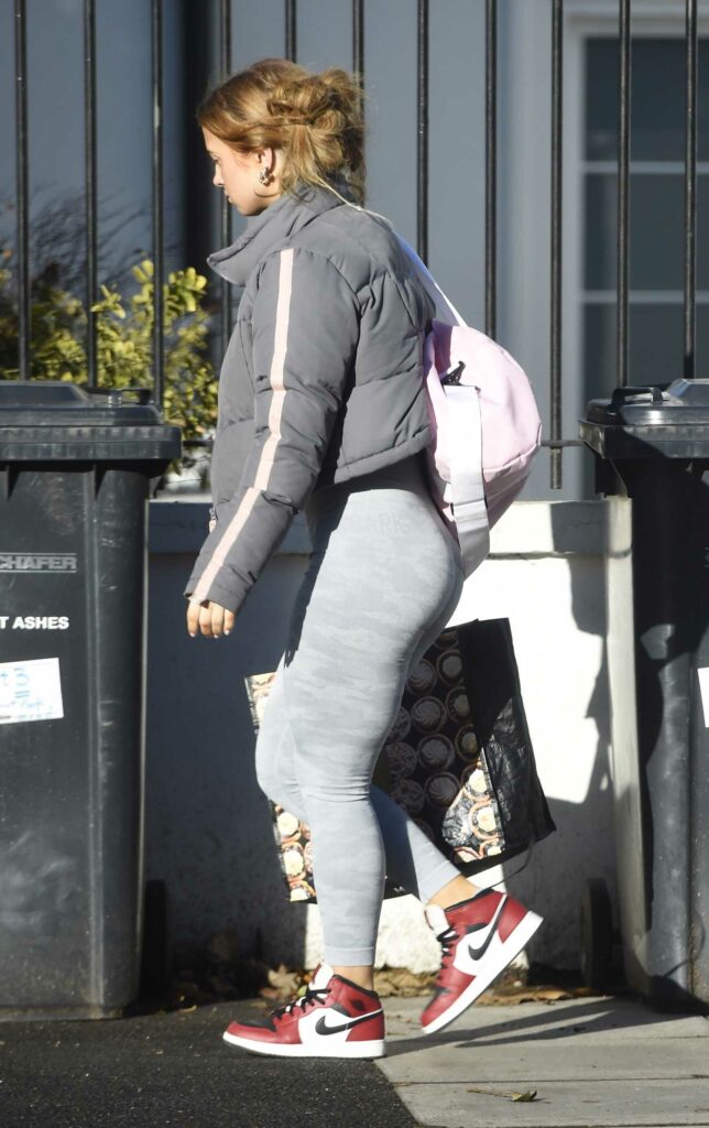 Maisie Smith in a Grey Leggings
