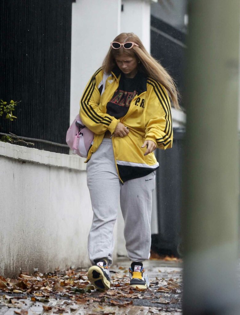 Maisie Smith in a Yellow Track Jacket