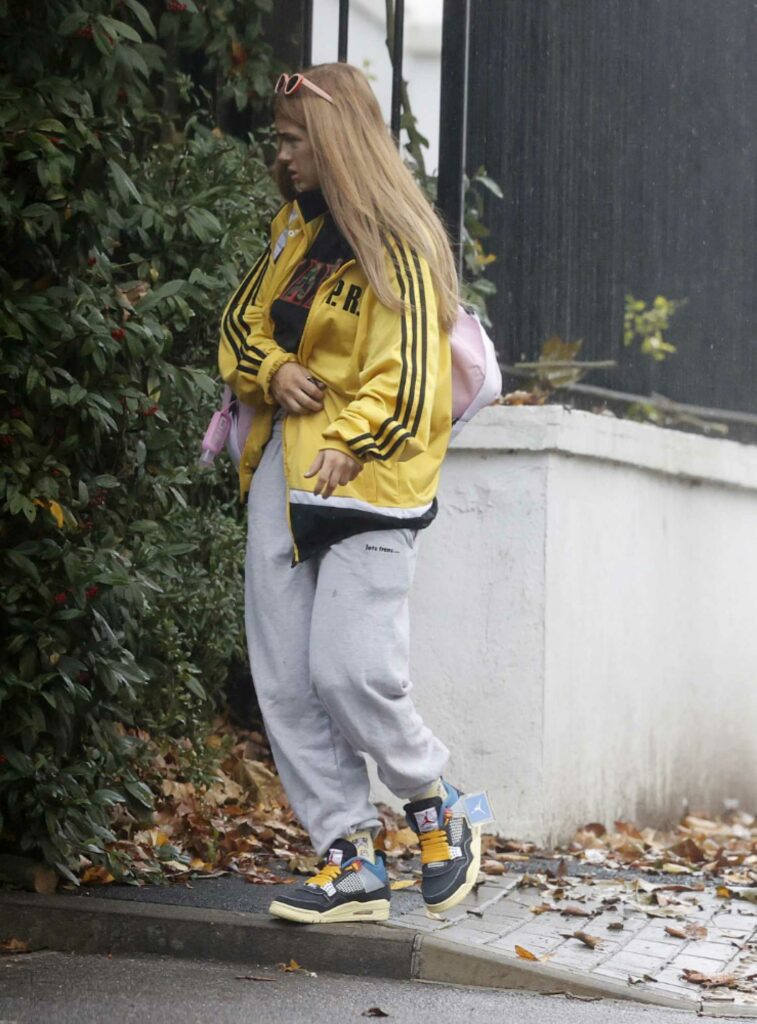 Maisie Smith in a Yellow Track Jacket