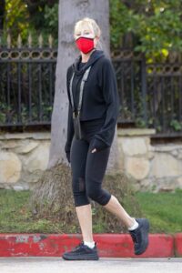 Melanie Griffith in a Red Protective Mask Takes a Morning Walk Around