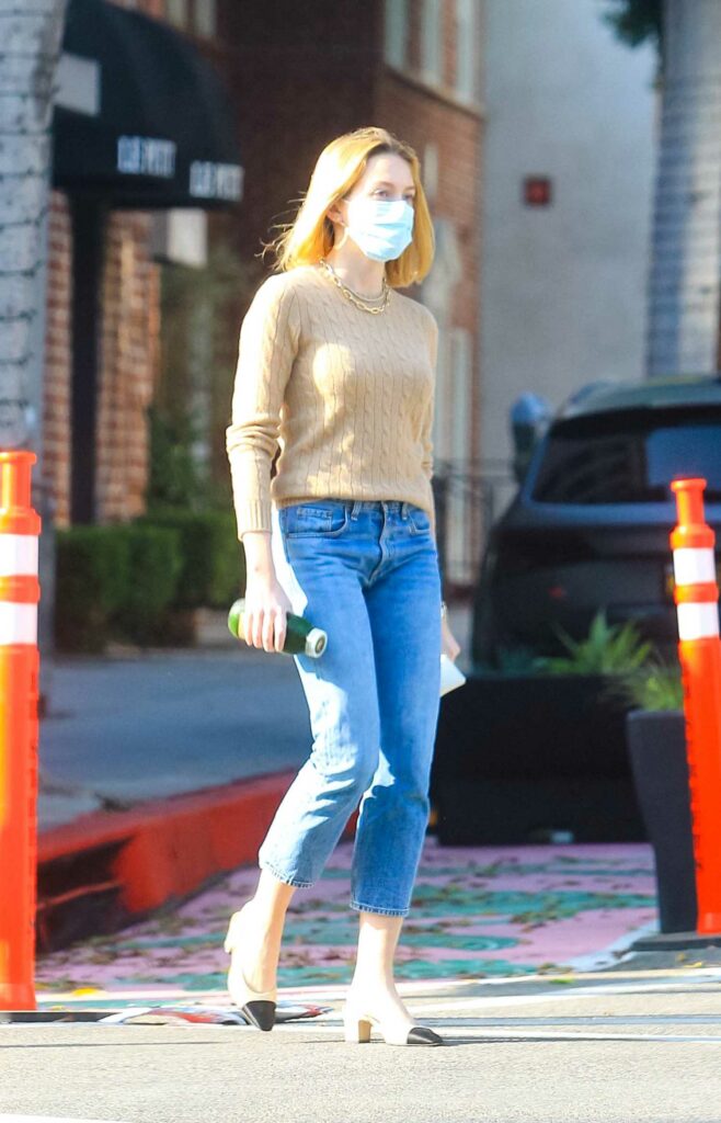 Olivia Holt in a Protective Mask