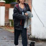 Sadie Frost in a Black Jacket Walks Her Dachshund Puppy in North London