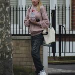 Zara Mcdermott in a Pink Hoodie Was Seen Out in London
