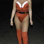 Apollonia Llewellyn in a Red Santa Swimsuit Enjoys a Night Out in Liverpool