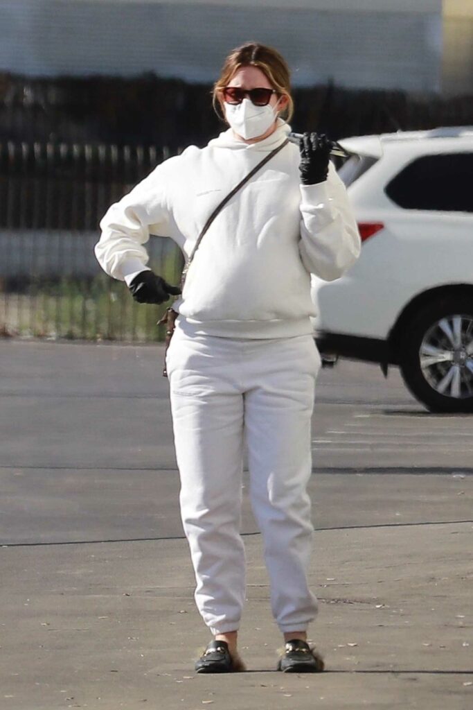 Ashley Tisdale in a White Hoodie
