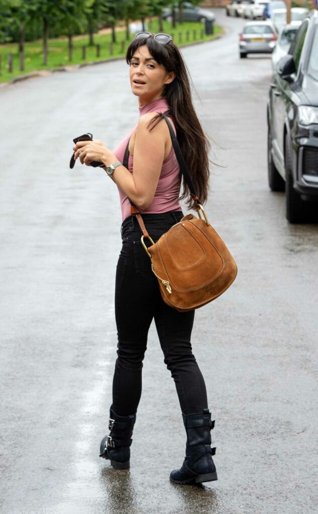 Casey Batchelor in a Pink Top