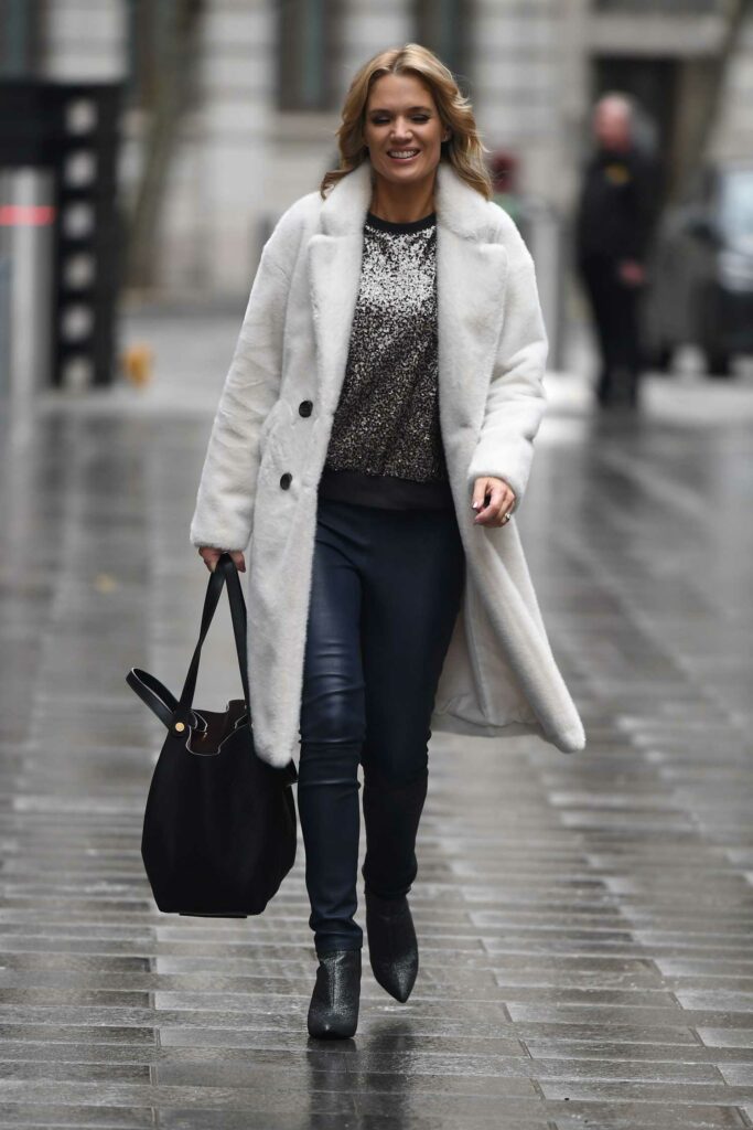 Charlotte Hawkins in a White Fur Coat