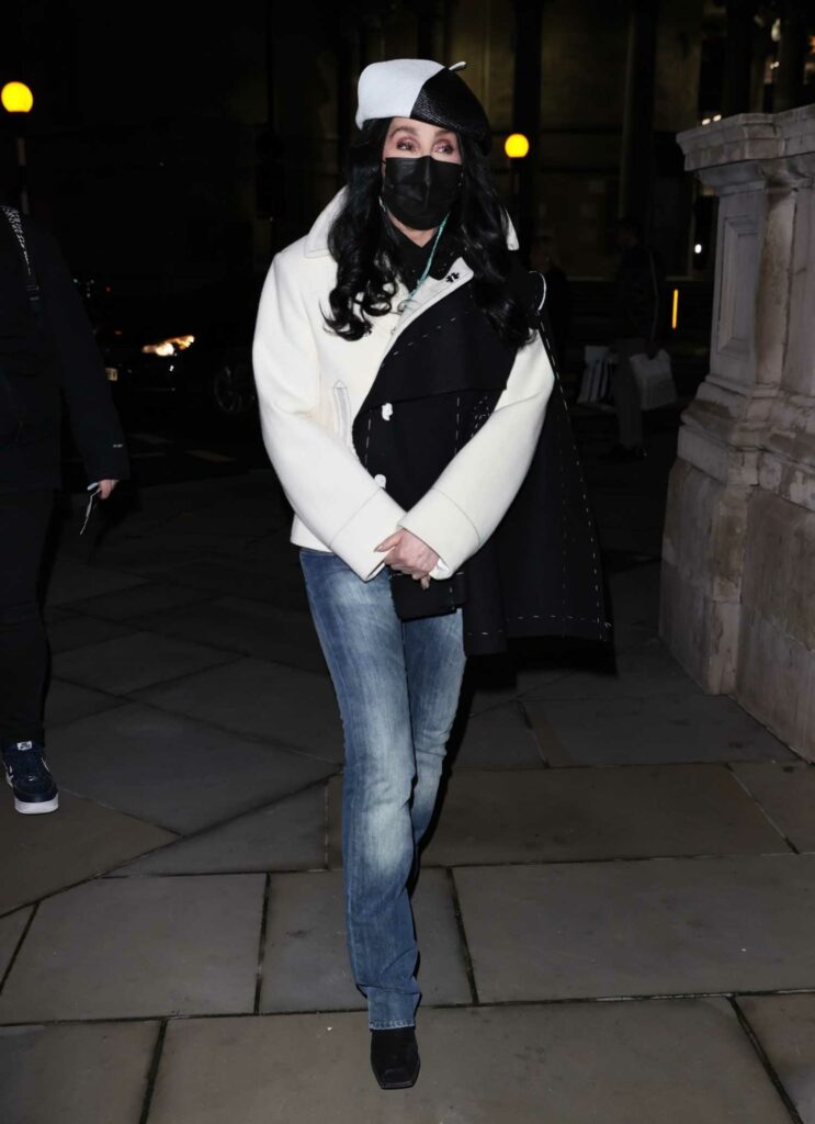 Cher in a Black Protective Mask