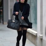 Faye Brookes in a Black Coat Leaves Evelyn House of Hair and Beauty in Manchester