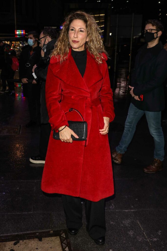 Gaynor Faye in a Red Coat