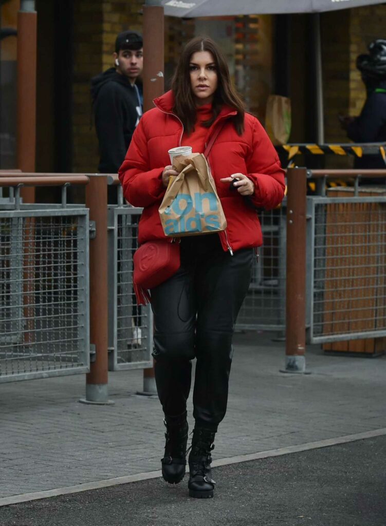 Imogen Thomas in a Red Puffer Jacket