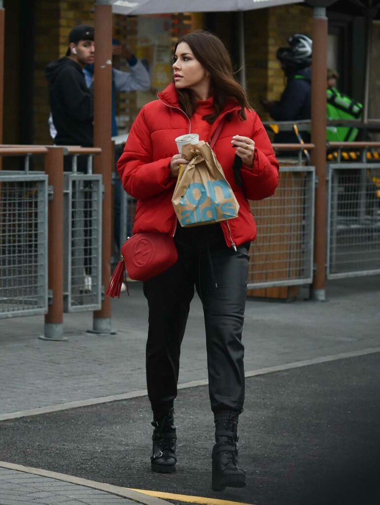 Imogen Thomas in a Red Puffer Jacket