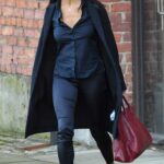 Jenny Powell in a Black Coat Leaves the Hits Radio in Manchester