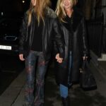 Kate Moss in a Black Coat Out with Lilly Grace Moss Arrives at Oswald’s Member’s Club in London