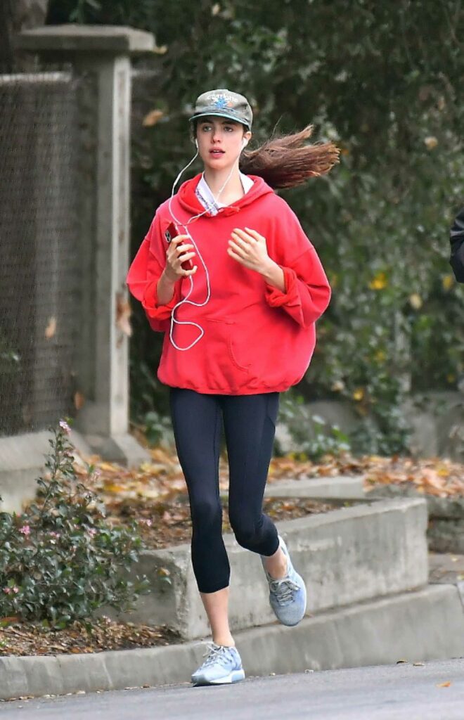 Margaret Qualley in a Red Hoodie