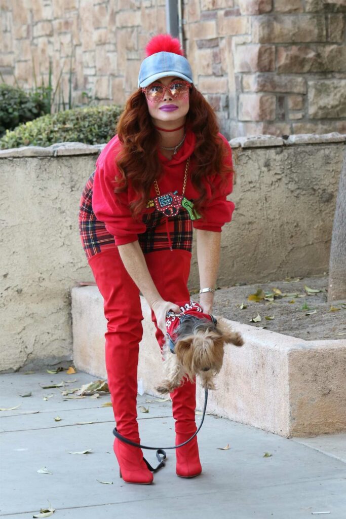 Phoebe Price in a Red Outfit