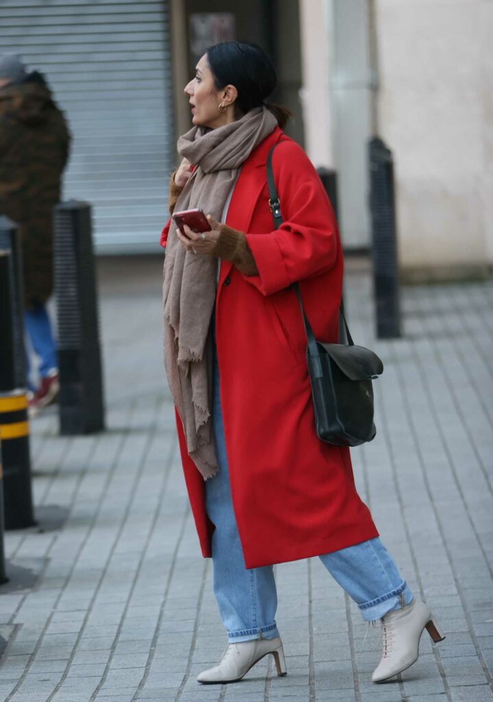 Anita Rani in a Red Coat