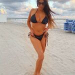 Claudia Romani in a Black Bikini on the Beach in Miami 01/21/2021
