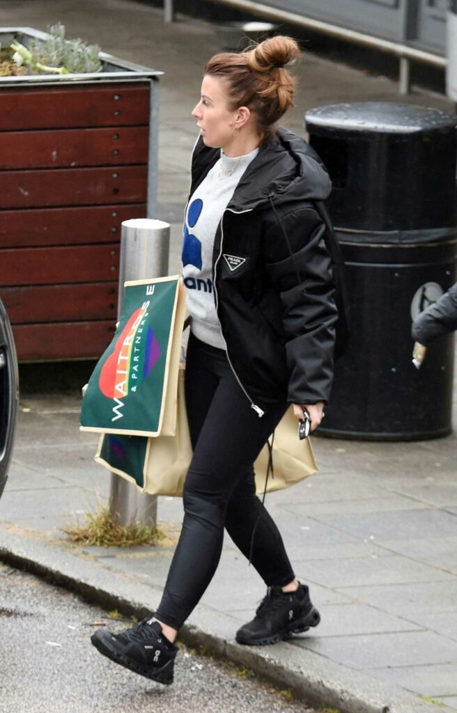 Coleen Rooney in a Black Prada Jacket