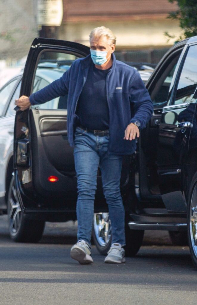 Dolph Lundgren in a Blue Track Jacket