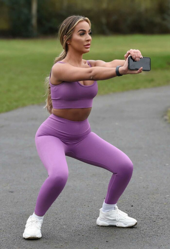 Holly Burns in a Purple Workout Ensemble