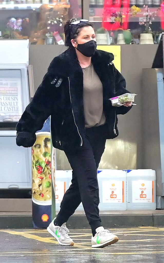 Jessie Wallace in a Black Protective Mask