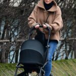 Kara Tointon in a Tan Sweater Walks Her Baby in North London