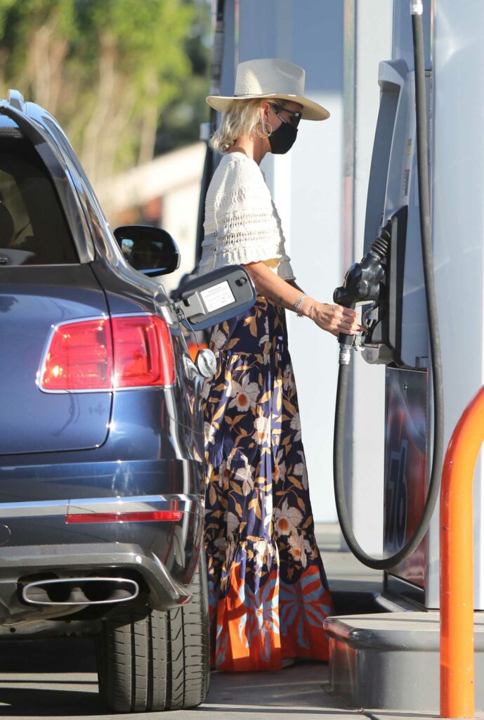 Laeticia Hallyday in a Floral Print Skirt