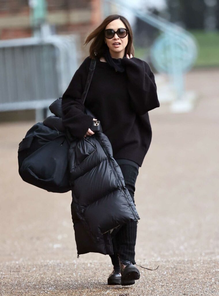 Myleene Klass in a Black Outfit