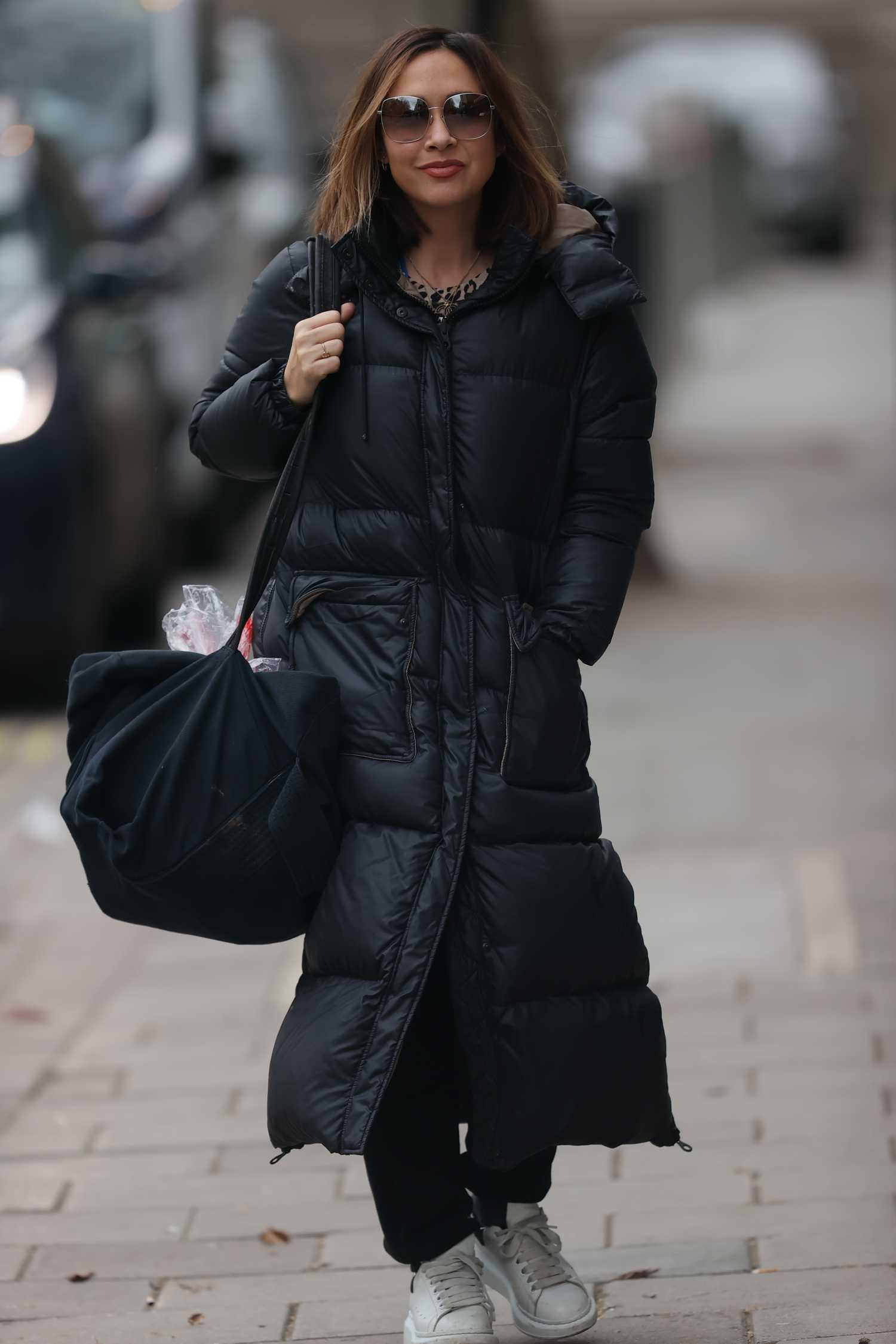 Myleene Klass in a Black Puffer Coat Arrives at the Global Offices in ...