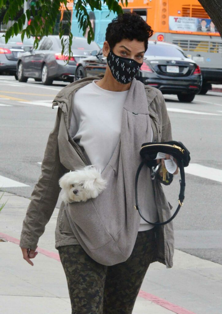 Nicole Murphy in a Black Protective Mask